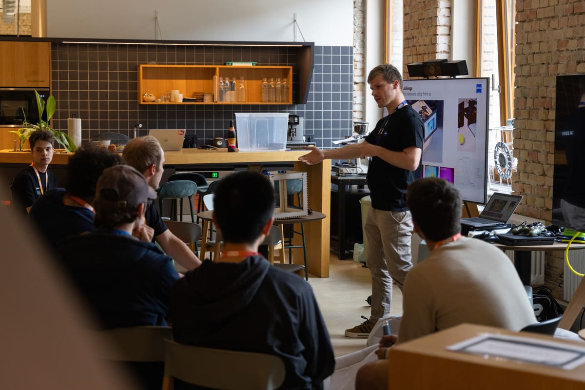 A HackXplore mentor delivering a talk to participants.